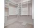 Walk-in closet with adjustable shelving and ample storage space at 8052 Marbella Cir, Las Vegas, NV 89128
