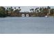 Beautiful lake view with bridge, palm trees, and serene waterfront atmosphere at 8052 Marbella Cir, Las Vegas, NV 89128