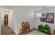 Comfortable bedroom with bright decor, shelving, and a playful rug at 816 Sand Camel Ct, North Las Vegas, NV 89081