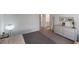 Spacious bedroom with serene decor, neutral tones, and access to an ensuite bathroom offering a comfortable retreat at 816 Sand Camel Ct, North Las Vegas, NV 89081