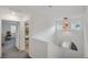 Bright hallway with stylish light fixtures, a mirror, and access to other rooms, creating a welcoming transition at 816 Sand Camel Ct, North Las Vegas, NV 89081