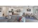 Open concept living space offering a modern kitchen, dining, and a comfortable living area at 816 Sand Camel Ct, North Las Vegas, NV 89081