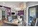 Contemporary dining room showcasing a glass table, modern chandelier, and stylish seating at 9000 S Las Vegas Blvd # 2222, Las Vegas, NV 89123