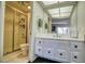 Bright bathroom featuring a glass shower and vanity at 940 Vegas Valley Dr, Las Vegas, NV 89109