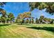 Expansive lawn with mature trees, offering a serene and picturesque outdoor setting at 940 Vegas Valley Dr, Las Vegas, NV 89109