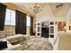 Bright living room with a chandelier, plush seating, and stylish decor, creating an elegant space at 940 Vegas Valley Dr, Las Vegas, NV 89109