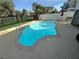Beautiful backyard pool with sunny deck, mature trees, and privacy fence at 940 Vegas Valley Dr, Las Vegas, NV 89109