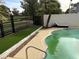 Refreshing pool with lush grass and a lounge chair, perfect for relaxation at 940 Vegas Valley Dr, Las Vegas, NV 89109