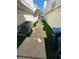 Wide side yard with concrete paver stones, artificial grass, and space for storage at 940 Vegas Valley Dr, Las Vegas, NV 89109