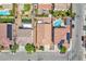 Aerial view showcasing backyard with pool, patio and well manicured greenery at 9588 Comiskey Ct, Las Vegas, NV 89148