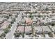 Aerial shot of neighborhood highlighting residences with private backyards, mature trees, and convenient street access at 9588 Comiskey Ct, Las Vegas, NV 89148
