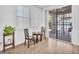 Bright breakfast nook by the kitchen featuring access to the backyard patio at 9588 Comiskey Ct, Las Vegas, NV 89148