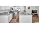 Modern kitchen featuring white cabinets, stainless steel appliances, and granite countertops at 9588 Comiskey Ct, Las Vegas, NV 89148