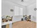 Office space with wood-look flooring and bright, neutral walls at 9588 Comiskey Ct, Las Vegas, NV 89148