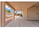 Covered patio with brick trim and a view of the fenced backyard, great for outdoor relaxation and entertaining at 9588 Comiskey Ct, Las Vegas, NV 89148