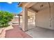 Covered patio leading to the backyard, featuring brick trim and an open layout for outdoor enjoyment at 9588 Comiskey Ct, Las Vegas, NV 89148