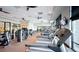 Bright fitness center with state-of-the-art exercise equipment including treadmills, machines, and ample space for workouts at 9858 Gemstone Sunset Ave, Las Vegas, NV 89148