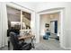 Bright office space with a large window, neutral walls, and modern decor at 9858 Gemstone Sunset Ave, Las Vegas, NV 89148