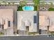 Aerial view of home with solar panels and backyard pool and spa at 10086 Mountain Foothills Ave, Las Vegas, NV 89149