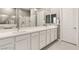 This bright bathroom offers a long, bright vanity and a step-in shower at 10086 Mountain Foothills Ave, Las Vegas, NV 89149