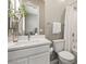 Bright bathroom with a white vanity, modern fixtures, and combined bath and shower at 10086 Mountain Foothills Ave, Las Vegas, NV 89149