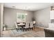 Dining room showcasing a dining table with seating, complemented by a window for natural light at 10086 Mountain Foothills Ave, Las Vegas, NV 89149