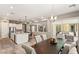 Dining area showcasing an open-concept layout with kitchen access and backyard view at 10086 Mountain Foothills Ave, Las Vegas, NV 89149