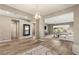 Spacious living room with hardwood floors and an open layout at 10086 Mountain Foothills Ave, Las Vegas, NV 89149