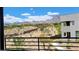 Balcony view of desert landscaping and mountain range in the distance of Summerlin community at 11593 Cedar Shore Ave, Las Vegas, NV 89138