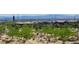 Picturesque view of neighborhood, walking path, desert landscaping, and mountains at 11593 Cedar Shore Ave, Las Vegas, NV 89138