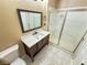 Bathroom vanity with sink, mirror and walk-in shower at 1300 S Arlington St # 202, Las Vegas, NV 89104