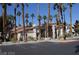 A luxurious clubhouse is set amidst lush landscaping and towering palm trees at 1300 S Arlington St # 202, Las Vegas, NV 89104
