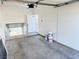 Spacious garage with a staircase leading to an above-garage apartment or loft at 1300 S Arlington St # 202, Las Vegas, NV 89104