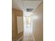 Neutral hallway featuring tiled flooring and lighting at 1300 S Arlington St # 202, Las Vegas, NV 89104