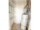 Hot water tank in utility closet with shelving at 1300 S Arlington St # 202, Las Vegas, NV 89104