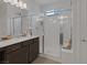 Bathroom featuring a glass shower door and modern fixtures at 1401 Cattail Falls St, Boulder City, NV 89005
