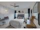 Bedroom featuring carpet, a ceiling fan, gray headboard, and charming decor at 1401 Cattail Falls St, Boulder City, NV 89005