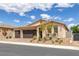 Charming single-story home with a three-car garage and well-manicured landscaping at 1401 Cattail Falls St, Boulder City, NV 89005