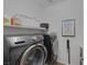Laundry room featuring new washing machines and storage at 1401 Cattail Falls St, Boulder City, NV 89005