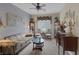 Traditional living room with patterned sofa, matching decor, and ample seating at 1401 Cattail Falls St, Boulder City, NV 89005
