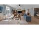 An open-concept living room features an entertainment center and comfortable seating at 1401 Cattail Falls St, Boulder City, NV 89005