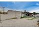 Backyard with a shed, gravel and sparse grass at 1708 Poplar Ave, Las Vegas, NV 89101