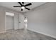 Bedroom featuring wood-look floors, ceiling fan, closet, and neutral paint at 1708 Poplar Ave, Las Vegas, NV 89101