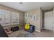 bedroom featuring a playful decor, carpeted floors and natural light at 2 Olympia Outlook Dr, Las Vegas, NV 89141