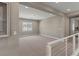 Bright bonus room with neutral paint, carpet flooring, and a large window at 2 Olympia Outlook Dr, Las Vegas, NV 89141