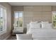 Spacious main bedroom with accent wall, plantation shutters, and natural light at 2 Olympia Outlook Dr, Las Vegas, NV 89141