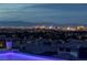Rooftop pool showcasing city views and neighborhood charm at twilight at 2 Olympia Outlook Dr, Las Vegas, NV 89141