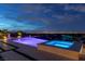 Luxury pool and spa area with city views at night at 2 Olympia Outlook Dr, Las Vegas, NV 89141