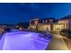 Backyard with pool, spa, lounge seating, and stunning views of the surrounding landscape at 2 Olympia Outlook Dr, Las Vegas, NV 89141