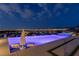 Relaxing pool and spa with stunning views of the city skyline at night at 2 Olympia Outlook Dr, Las Vegas, NV 89141